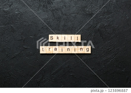 skills training word written on wood block. skills training text on cement table for your desing, concept 123896887