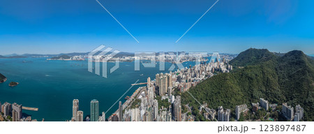 Feb 9 2021 Panoramic View of Hong Kong Skyline and Victoria Harbour Feb 9 2021 Panoramic View of Hong Kong Skyline and Victoria Harbour 123897487