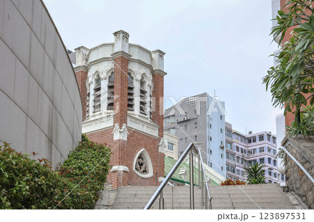 Dec 24 2024 Church Tower Amid Viewed from Stone Staircase at HK 123897531