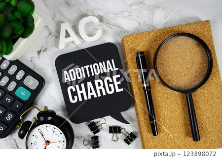 AC - Additional Charge acronym with calculator, alarm clock and magnifying glass, Business concept background 123898072