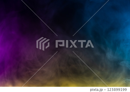 Blurred photo texture of colored smoke on a black background. 123899199