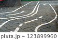 Playground pavement with painted road lines and arrows for children play 123899960