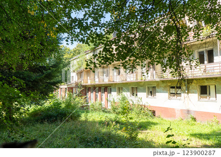 Abandoned old building of the 19th century sanatorium. House with broken windows and balconies. Ukraine, Truskavets 123900287