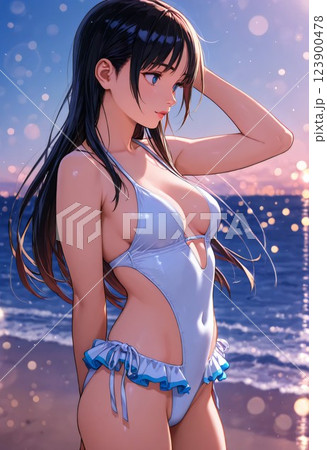 海の砂浜に立つ水着の若い女性 123900478
