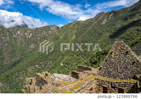 Ancient terraces and stone walls inside the Machu Picchu site in Peru 123900766