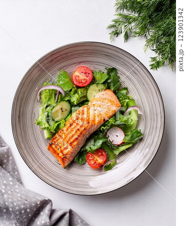 Salmon pepper grilled. Salmon freshly grilled and pepper-crusted Served with panzanella 123901342