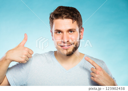 Happy man with half shaved face beard hair. 123902438