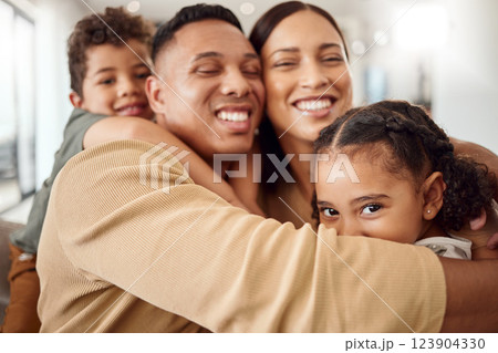 Love, family and hug portrait in living room with Mexican parents and young kids in house. Care and happy latino man, woman and children enjoy cuddle together for care and affection in home Love, family and hug portrait in living room with Mexican parents and young kids in house. Care and happy latino man, woman and children enjoy cuddle together for care and affection in home 123904330