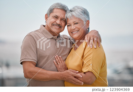 Happy, love and portrait of a senior couple in retirement, bonding and embracing in nature. Happiness, smile and elderly man and woman from Puerto Rico hugging with care, romance and joy outdoors. Happy, love and portrait of a senior couple in retirement, bonding and embracing in nature. Happiness, smile and elderly man and woman from Puerto Rico hugging with care, romance and joy outdoors. 123904369