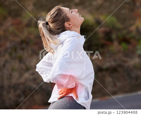Woman, back pain and exercise, fitness injury and muscle ache, inflammation while training for sport outdoor. Runner, athlete and health, hurt and backache during run, cardio in road and healthcare. 123904408