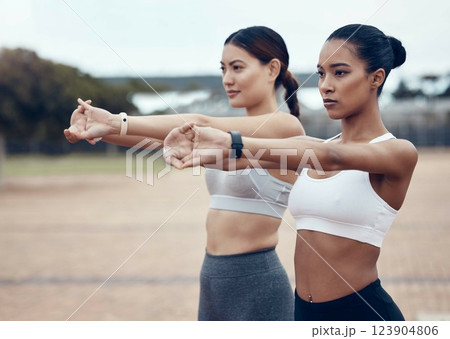 Fitness women, friends and stretching arms in nature for wellness or flexibility. Workout, diversity and females stretch, warm up or prepare before training, running or exercise at park together. Fitness women, friends and stretching arms in nature for wellness or flexibility. Workout, diversity and females stretch, warm up or prepare before training, running or exercise at park together. 123904806