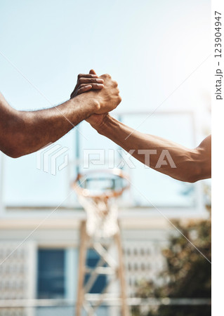 Basketball men handshake before game at sport court for good luck, agreement and support. Sports, fitness and athletes shaking hands to show unity, thank you and agreement for success during match Basketball men handshake before game at sport court for good luck, agreement and support. Sports, fitness and athletes shaking hands to show unity, thank you and agreement for success during match 123904947
