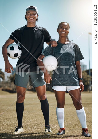 Friends, soccer and fitness, soccer field and soccer player together for workout and sport training outdoor portrait. Black woman, Mexican man and soccer ball, sports motivation and team in game. 123905112