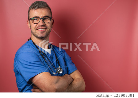 Healthcare professional with stethoscope poses confidently in clinical setting 123905391