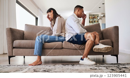 Fight, frustrated and couple with a problem in their marriage on the living room sofa of their house. Sad, angry and depressed man and woman thinking of divorce, conflict and mistake on the couch Fight, frustrated and couple with a problem in their marriage on the living room sofa of their house. Sad, angry and depressed man and woman thinking of divorce, conflict and mistake on the couch 123905441