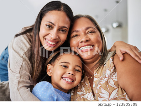 Love, family and portrait of multigenerational women on a sofa, relax, happy and bonding in a living room. Portrait, mother, girl and grandma smile, hug and relaxing on a couch enjoying quality time Love, family and portrait of multigenerational women on a sofa, relax, happy and bonding in a living room. Portrait, mother, girl and grandma smile, hug and relaxing on a couch enjoying quality time 123905509
