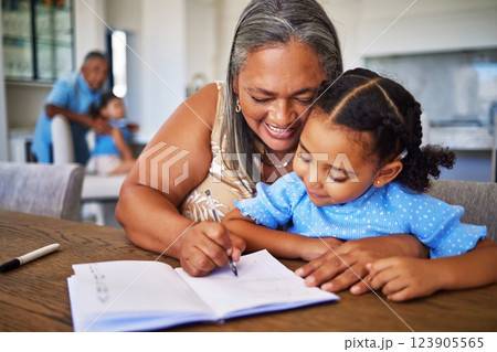 Learning, writing and notebook with grandma and girl for education, study and family help with homework. Care, love and idea with child and old woman and book for teaching, student and remote work 123905565