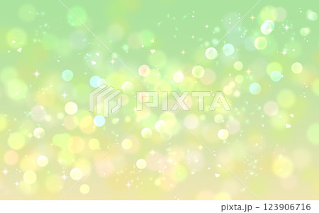 黄緑と黄色のグラデーションのキラキラ背景　イルミネーション　玉ボケ　光 123906716