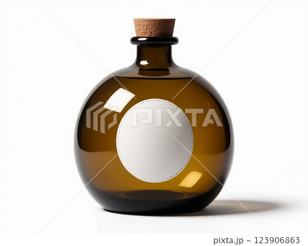 Elegant round glass bottle with cork top and empty label on a white background Elegant round glass bottle with cork top and empty label on a white background 123906863