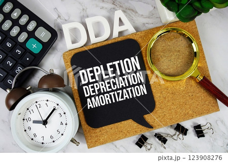 DDA - Depletion Depreciation Amortization acronym with calculator, alarm clock and magnifying glass, Business and Financial concept background DDA - Depletion Depreciation Amortization acronym with calculator, alarm clock and magnifying glass, Business and Financial concept background 123908276