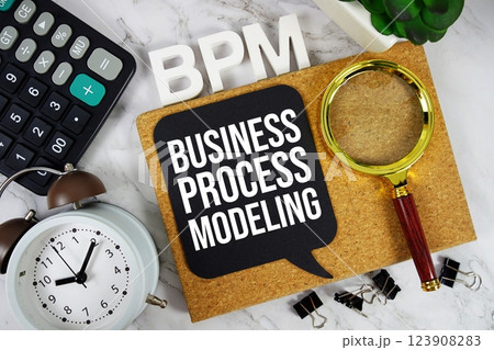 BPM Business Process Modeling acronym with calculator, alarm clock and magnifying glass, business concept background 123908283