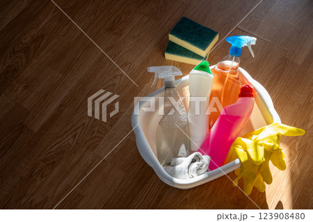 Home cleaning tools. Bottles of cleaning products, sponges and rubber gloves. Home cleaning tools. Bottles of cleaning products, sponges and rubber gloves. 123908480