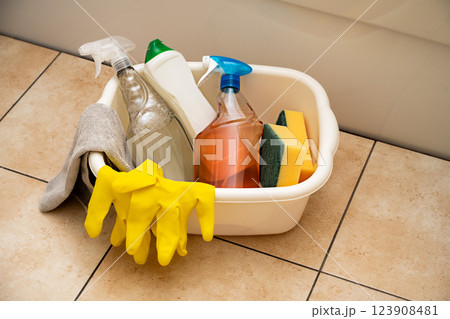 Home bathroom toilet cleaning concept. Bottles of cleaning products, sponges and rubber gloves. Home bathroom toilet cleaning concept. Bottles of cleaning products, sponges and rubber gloves. 123908481