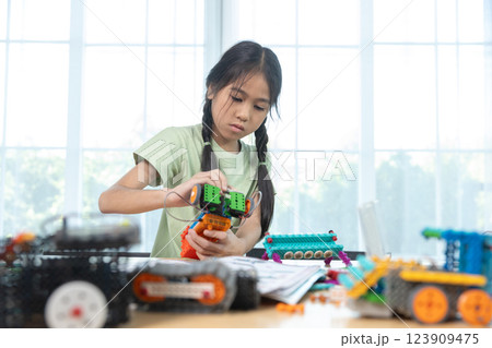 Education STEM children student classroom in school. Robot assembly training, brain development, Kid learning electrical future engineering. Education STEM children student classroom in school. Robot assembly training, brain development, Kid learning electrical future engineering. 123909475