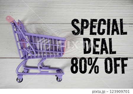 Special Deal 80% off and trolley shopping cart on wooden background 123909701