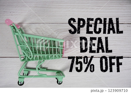 Special Deal 75% off and trolley shopping cart on wooden background Special Deal 75% off and trolley shopping cart on wooden background 123909710