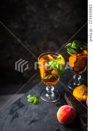 Cold ice tea with peach and mint Cold ice tea with peach and mint 123910983