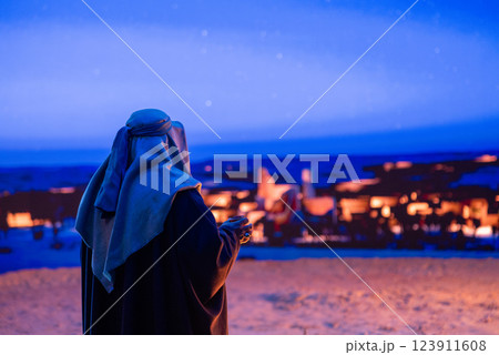 Bedouin Under the Starry Desert Sky Bedouin Under the Starry Desert Sky 123911608