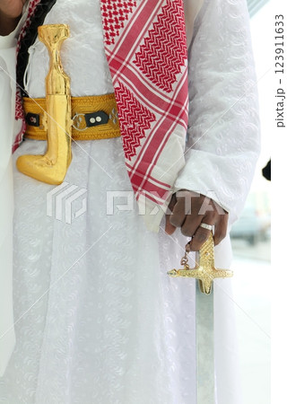 Traditional Saudi Arabian Warrior - Attire Jambiya and Sword Traditional Saudi Arabian Warrior - Attire Jambiya and Sword 123911633