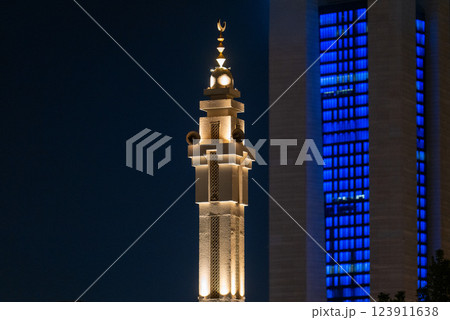 Illuminated Mosque Minaret at Night 123911638