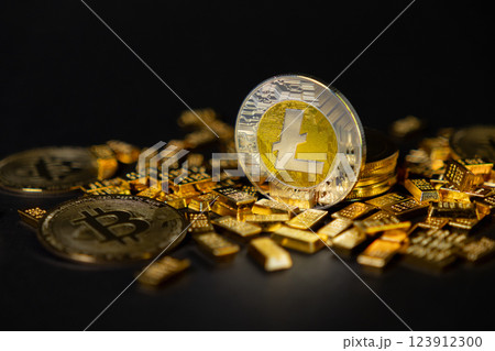litecoin coin with gold bars and bitcoin on a dark background, representing digital currency, financial success, and cryptocurrency investment potential 123912300