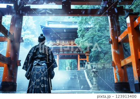 Lone samurai standing guard at a shinto shrine entrance Lone samurai standing guard at a shinto shrine entrance 123913400