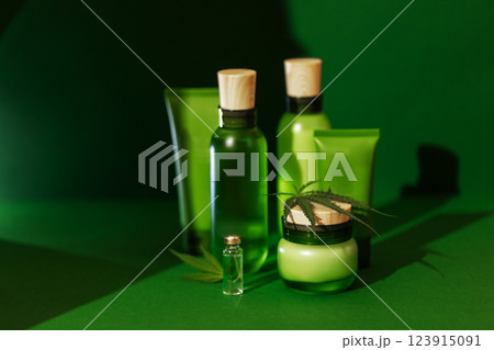 Clean mockups of cosmetic products and cannabis leaves. Clean mockups of cosmetic products and cannabis leaves. 123915091