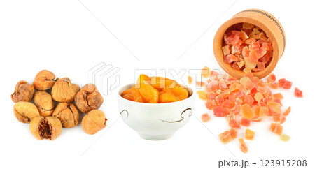 Set of dried fruits (dried apricots, figs, papaya) isolated on white background. 123915208
