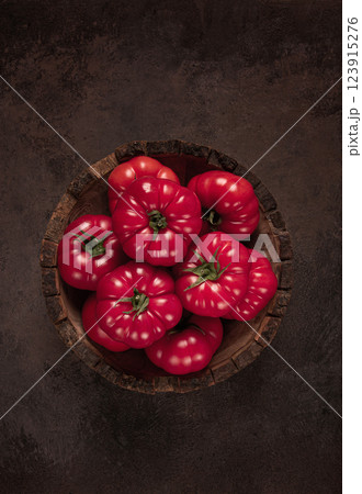 Pink tomatoes, in a rustic wooden bowl, close-up, no people, 123915276