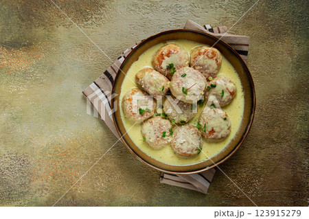 chicken meatballs, in cream sauce, garnished with parmesan cheese, and microgreens, homemade, no people, 123915279