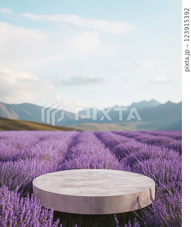 Empty stone podium in the lavender field. Mountains background. For displaying natural products. 123915392