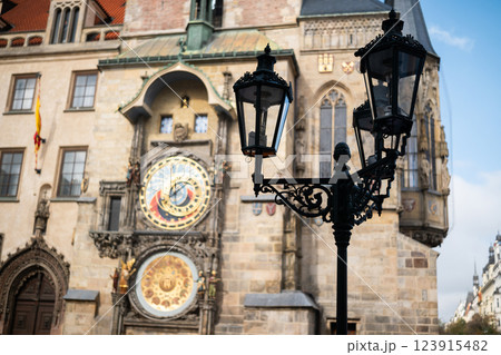 Hall Tower With An Astronomical Clock Stands On A Market Square In Prague Against A Blue Sky 123915482