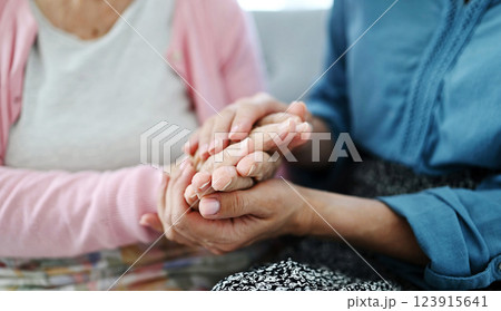 Old Woman And Her Daughter Hold Hands, Comforting Her Old Woman And Her Daughter Hold Hands, Comforting Her 123915641