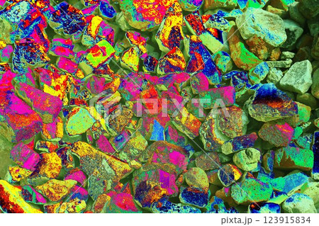 Pile of broken bricks, changed colors. Bright colorful background. 123915834