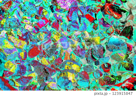 Pile of broken bricks, changed colors. Bright colorful background. 123915847