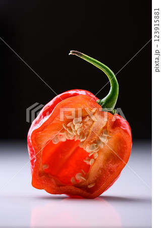 Cut in half habanero pepper with seeds Cut in half habanero pepper with seeds 123915881