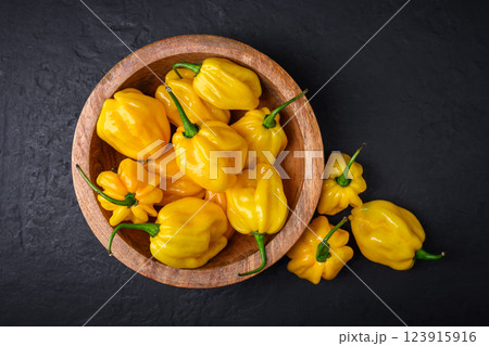 Top view of ripened yellow habanero peppers 123915916