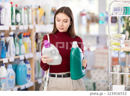 store visitor chooses a fabric softener 123916552