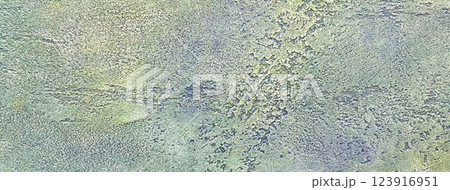 Old light green and blue wall background covered with shabby peeling plaster. Texture vintage backdrop 123916951