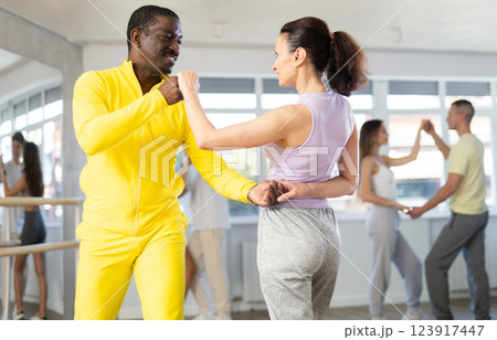 Adult man and woman dancing latin dances Adult man and woman dancing latin dances 123917447